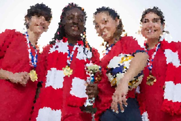 Diverse group of five people in red and white uniforms celebrate a victory with a trophy and medals.