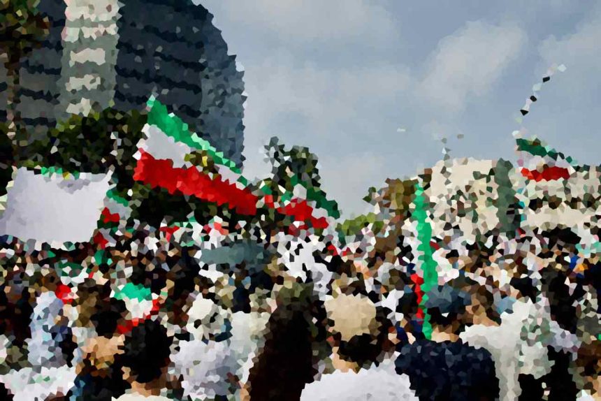 Crowd of people at a street parade with hints of Italian flag colors in banners and decorationsTE