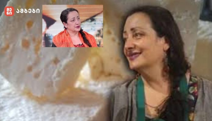 Smiling woman with dark hair and green lanyard on a TV interview set; inset shows another woman in an orange scarf, with a red logo in the top-left corner.