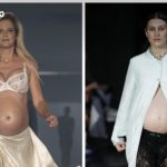 Two pregnant models walk a fashion show runway, one in lace bra and satin skirt, the other in an open shirt revealing a baby bump.
