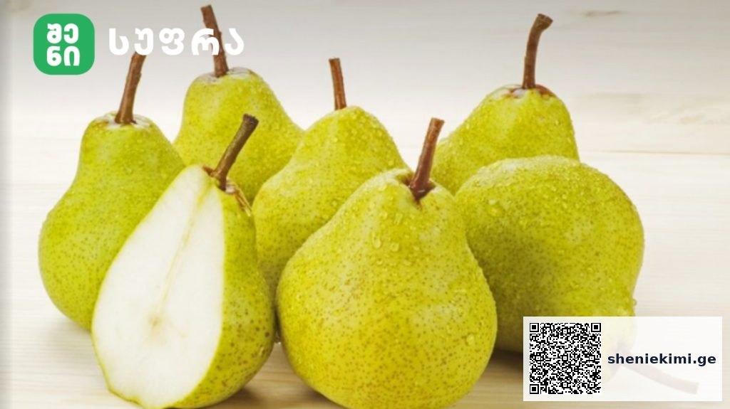 Assortment of green pears on a light wooden surface, one pear cut open to show white flesh and seeds, with a logo in the top-left corner.