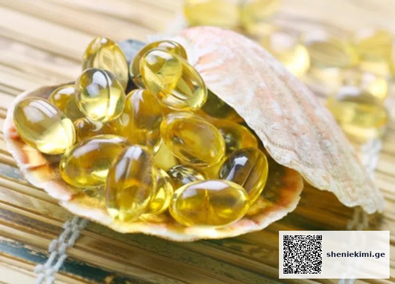 Seashell filled with yellow softgel capsules on a woven mat, suggesting fish oil capsules.