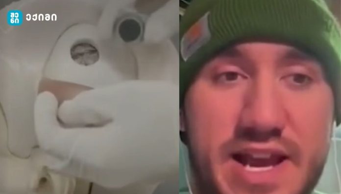 Split-screen video thumbnail: left shows a white cartoon character in a mask, right shows a man wearing a green beanie speaking